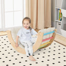 Colourful wooden arch with cushion shown in awake rocking-chair use