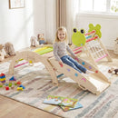 Child using the sliding face of the frog climbing set ramp