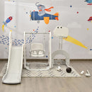 White and grey slide and swing playset with ball accessories in a playroom