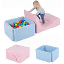 Pink climbing pieces and blue ball pit; play balls shown are not included
