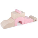Pink six-piece foam play set with two slopes, a bridge, cylinder and nested arches