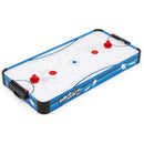Blue and white tabletop air hockey game with red pushers and pucks
