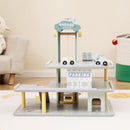 Wooden Toy Parking Garage with Lift and Helipad – garage displayed in a playroom